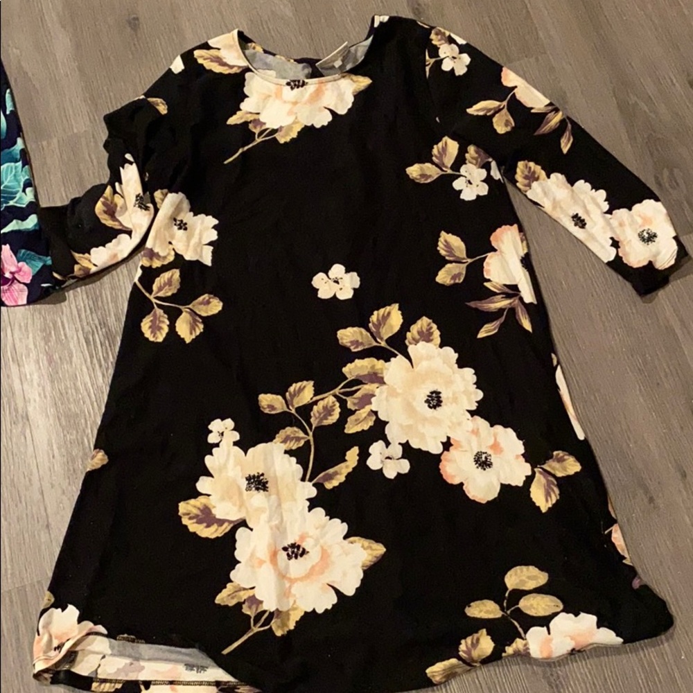 Black and cream colored dress with flowers
